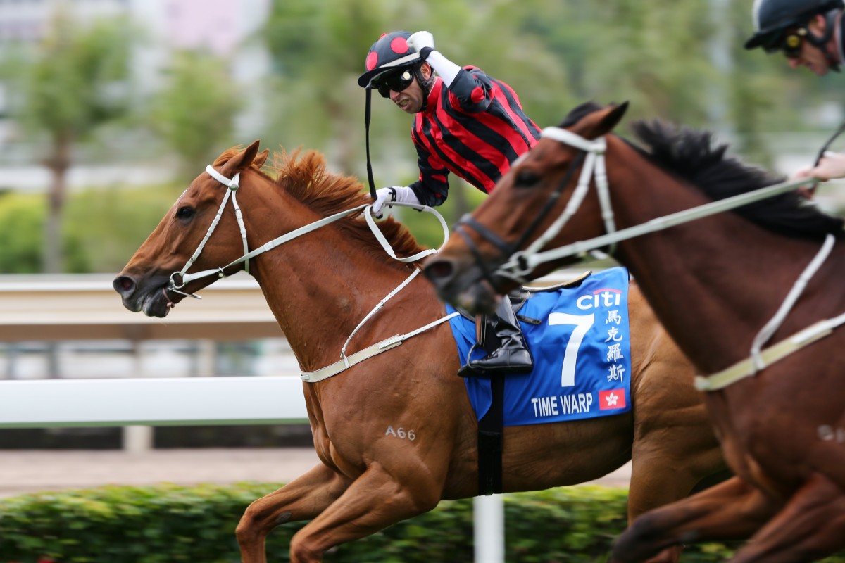 Joao Moreira salutes as Time Warp holds off Exultant in the Group One Citi Hong Kong Gold Cup. Photos: Kenneth Chan