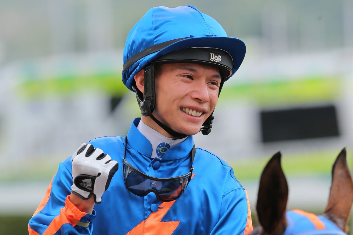 Victor Wong celebrates his breakthrough win aboard Smiling Success. Photos: Kenneth Chan