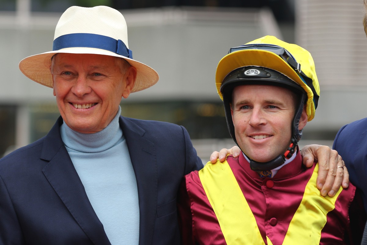 Trainer John Moore with jockey Tommy Berry. Photos: Kenneth Chan