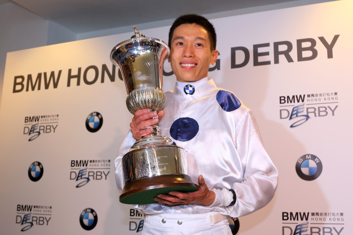 Vincent Ho poses with the Hong Kong Derby trophy. Photos: Kenneth Chan