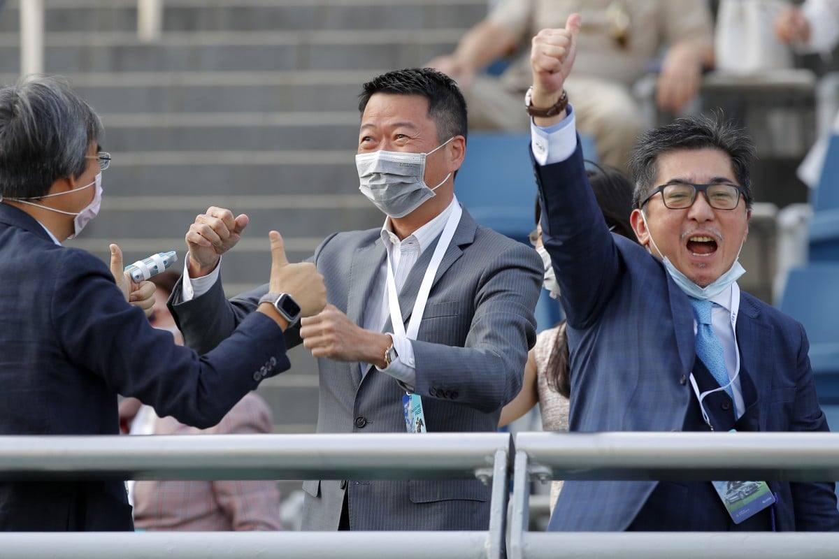 Golden Sixty’s owner Stanley Chan Ka-leung (right) celebrates his victory in the Hong Kong Derby. Photos: Kenneth Chan