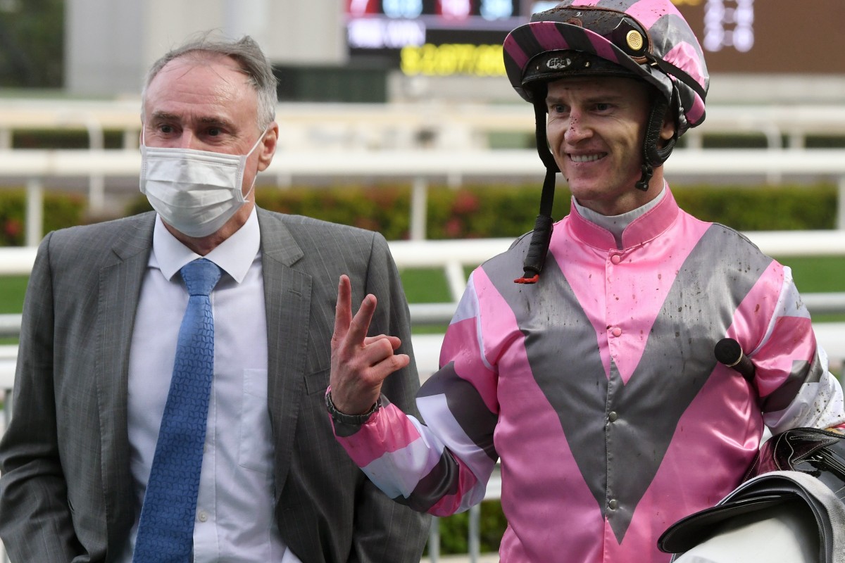 Paul O’Sullivan with jockey Zac Purton after winning with Band Of Brothers at Sha Tin on Sunday. Photos: Kenneth Chan