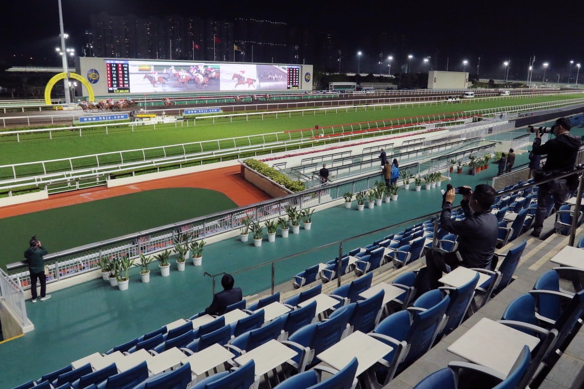 Horses race in front of a sparse Sha Tin on Wednesday night. Photos: Kenneth Chan