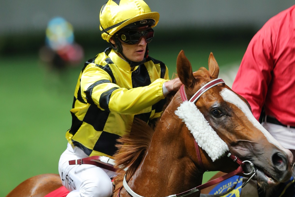 Zac Purton gives Stronger a pat after his track record in February. Photos: Kenneth Chan