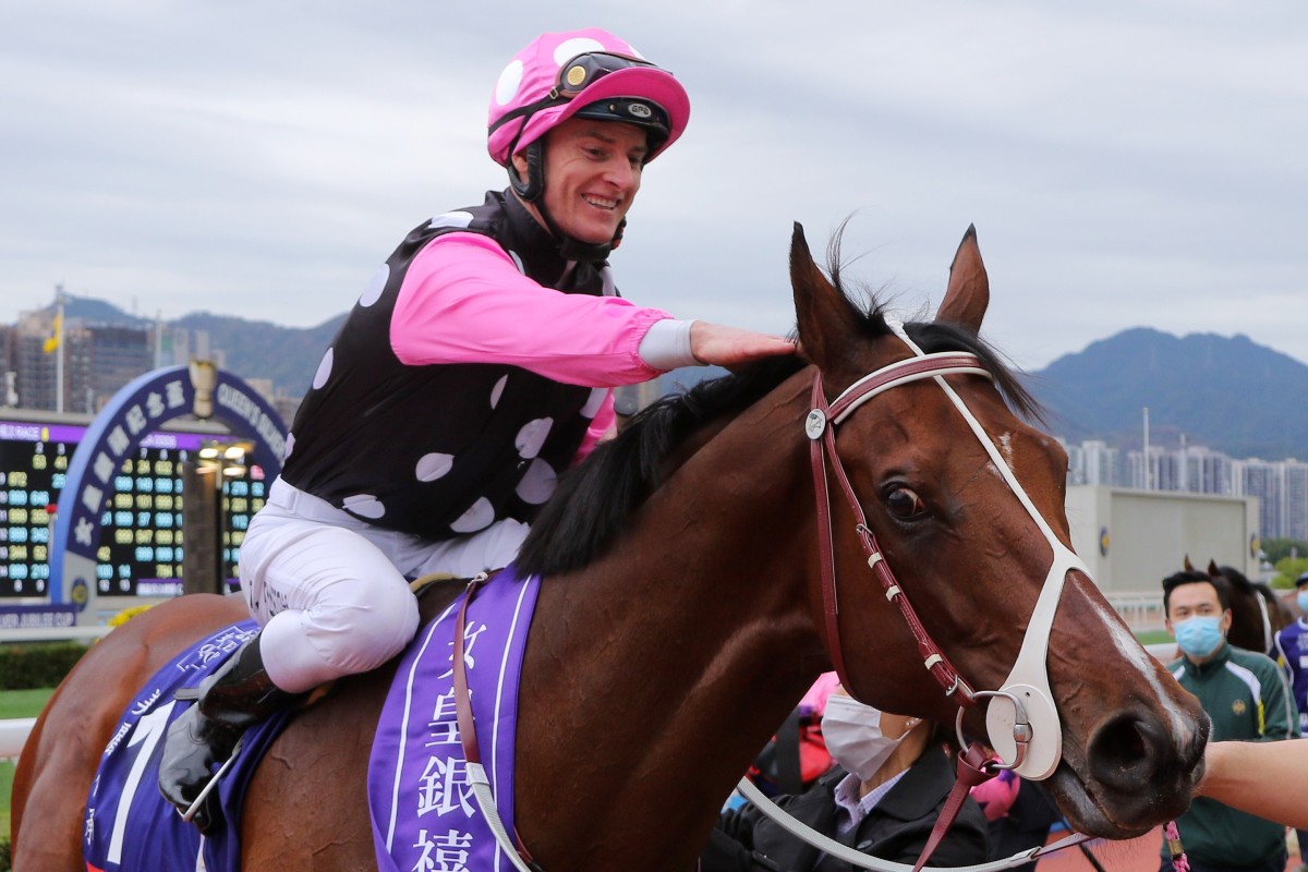 Zac Purton gives Beauty Generation a pat after winning the Queen's Silver Jubilee Cup in February. Photos: Kenneth Chan