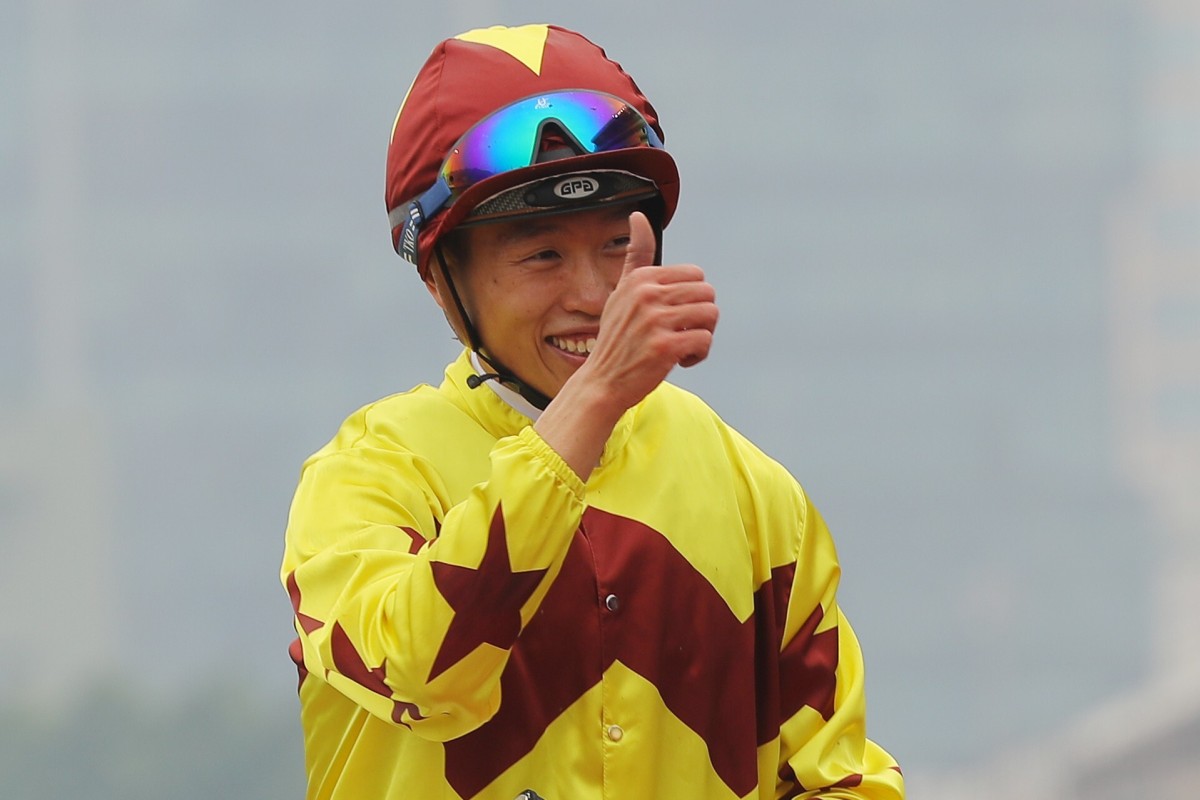 Vincent Ho is all smiles after winning his first Group One at Sha Tin on Sunday. Photos: Kenneth Chan