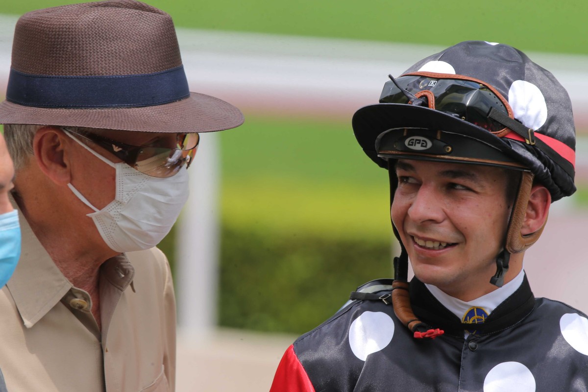 John Moore and Vagner Borges celebrate Touch Of Luck’s victory. Photo: Kenneth Chan