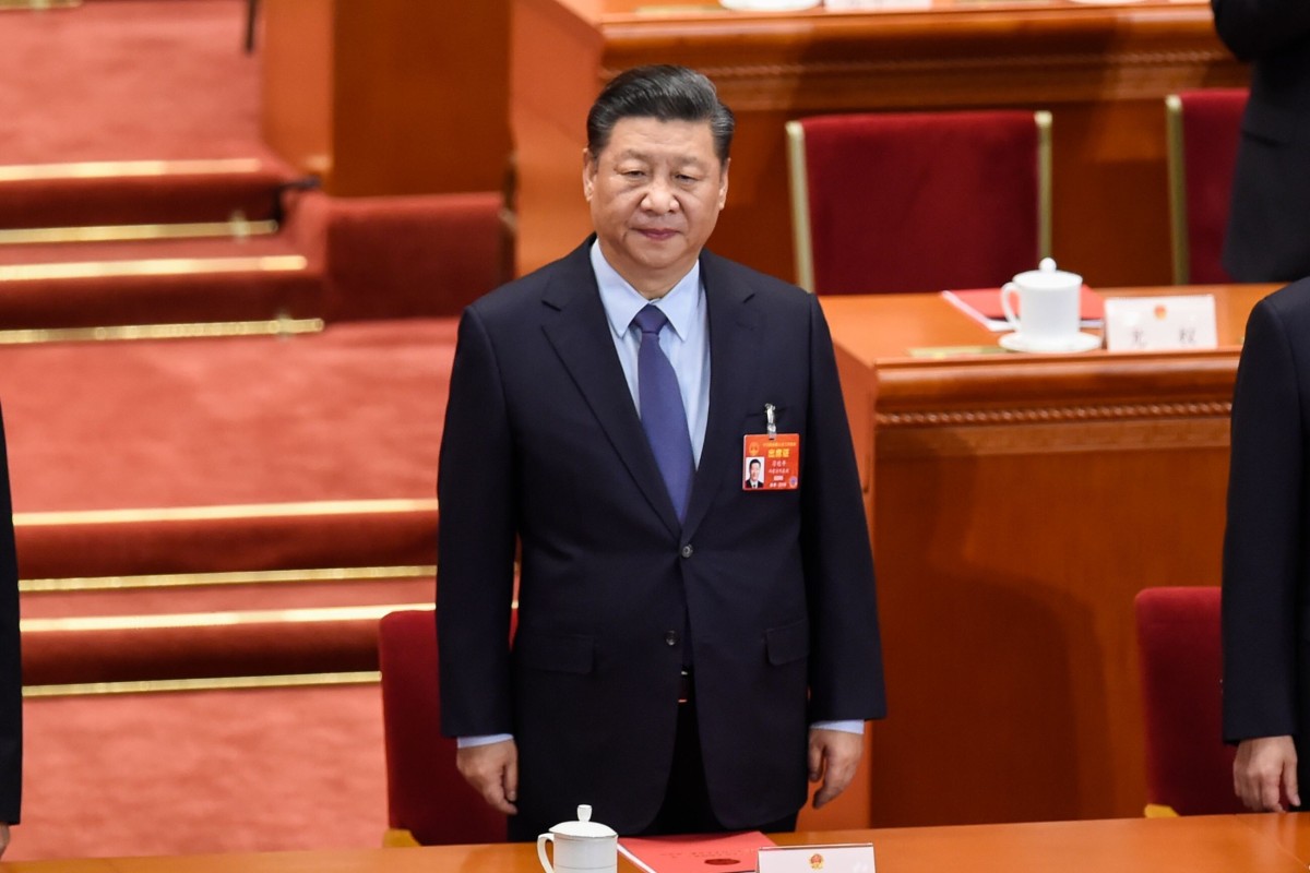 This file photo taken on March 15, 2019 shows Chinese President Xi Jinping arriving for the closing session of the National People's Congress (NPC) in Beijing's Great Hall of the People.