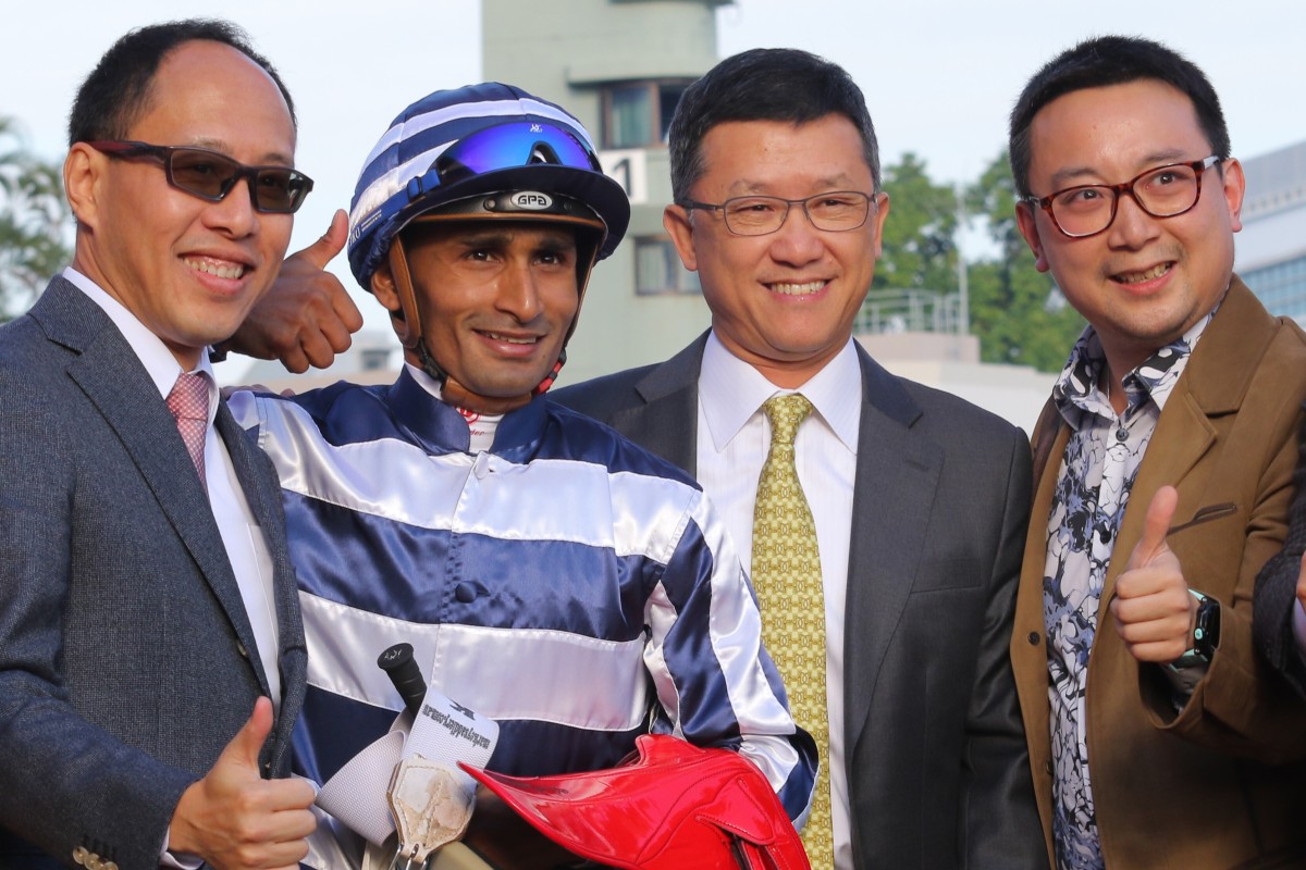 Raymond (left) and Edmond Lee (far right) celebrate a winner at Sha Tin with jockey Karis Teetan and trainer Peter Ho. Photos: Kenneth Chan
