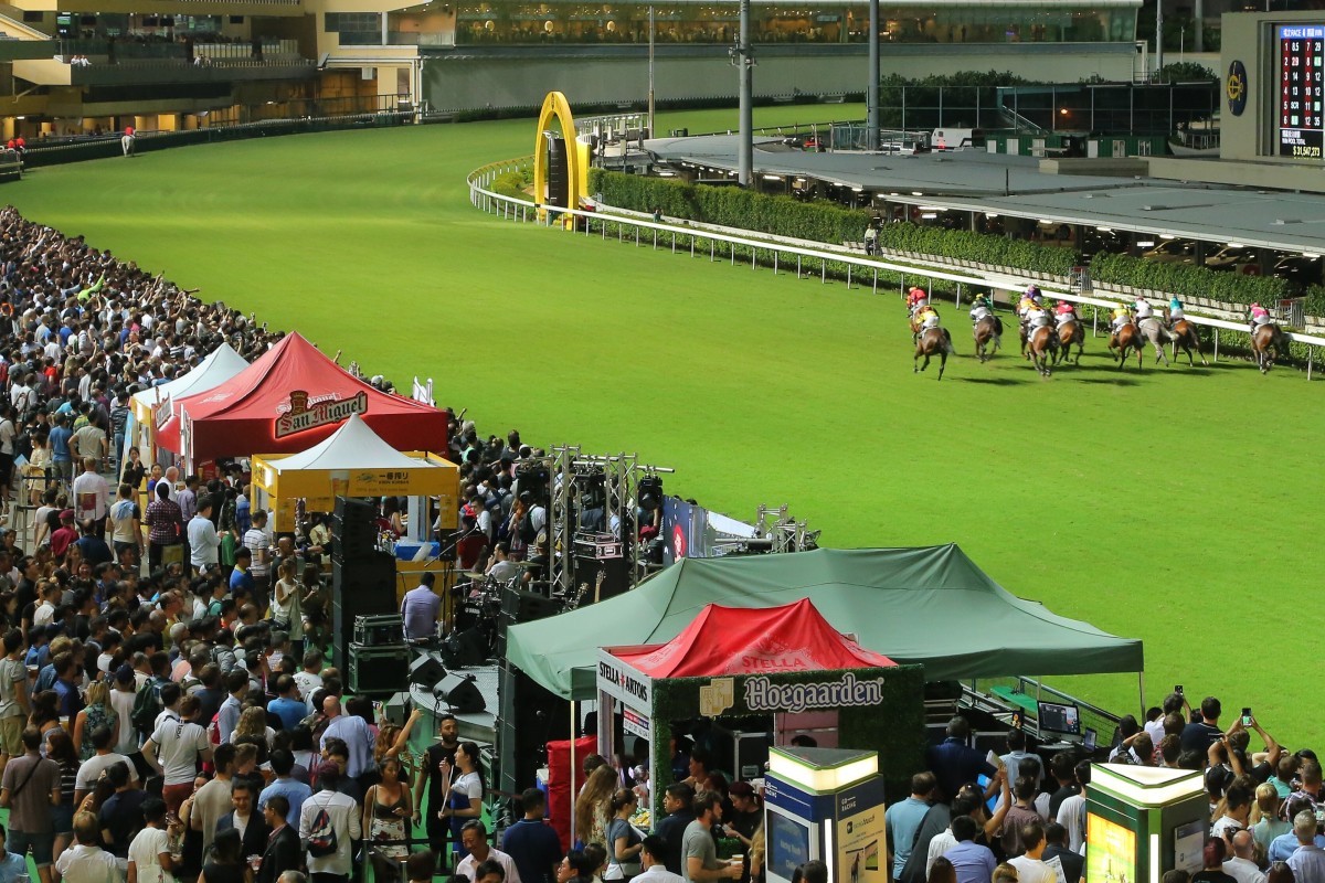 Horses race up the straight at Happy Valley. Photos: Kenneth Chan