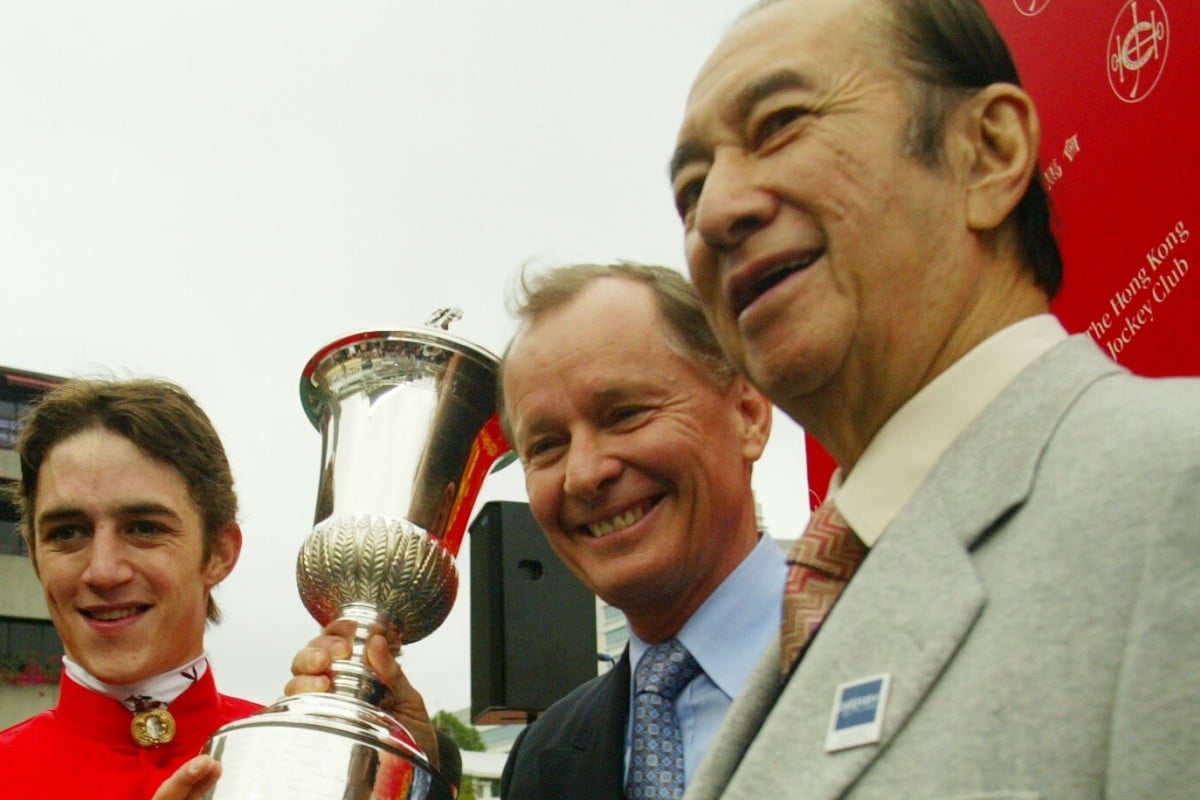 Stanley Ho celebrates Viva Pataca’s win in the 2006 Hong Kong Derby with jockey Christophe Soumillon and trainer John Moore. Photos: Kenneth Chan