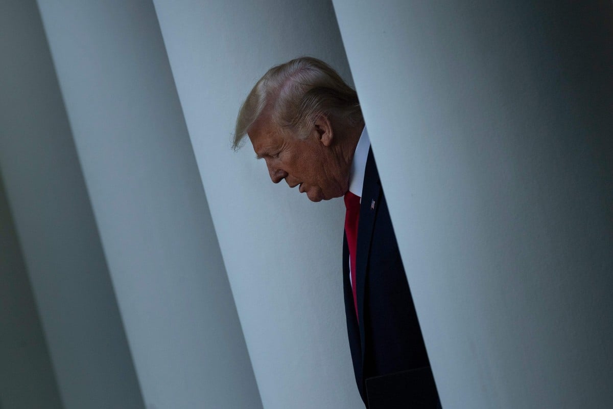 US President Donald Trump walks to the Rose Garden of the White House for an event on protecting seniors with diabetes in the Rose Garden of the White House in Washington, DC, on May 26, 2020. - Trump announced new choices of Medicare Part D plans that will offer insulin at affordable and predictable prices of no more than $35 for a month’s supply. (Photo by Brendan Smialowski / AFP)