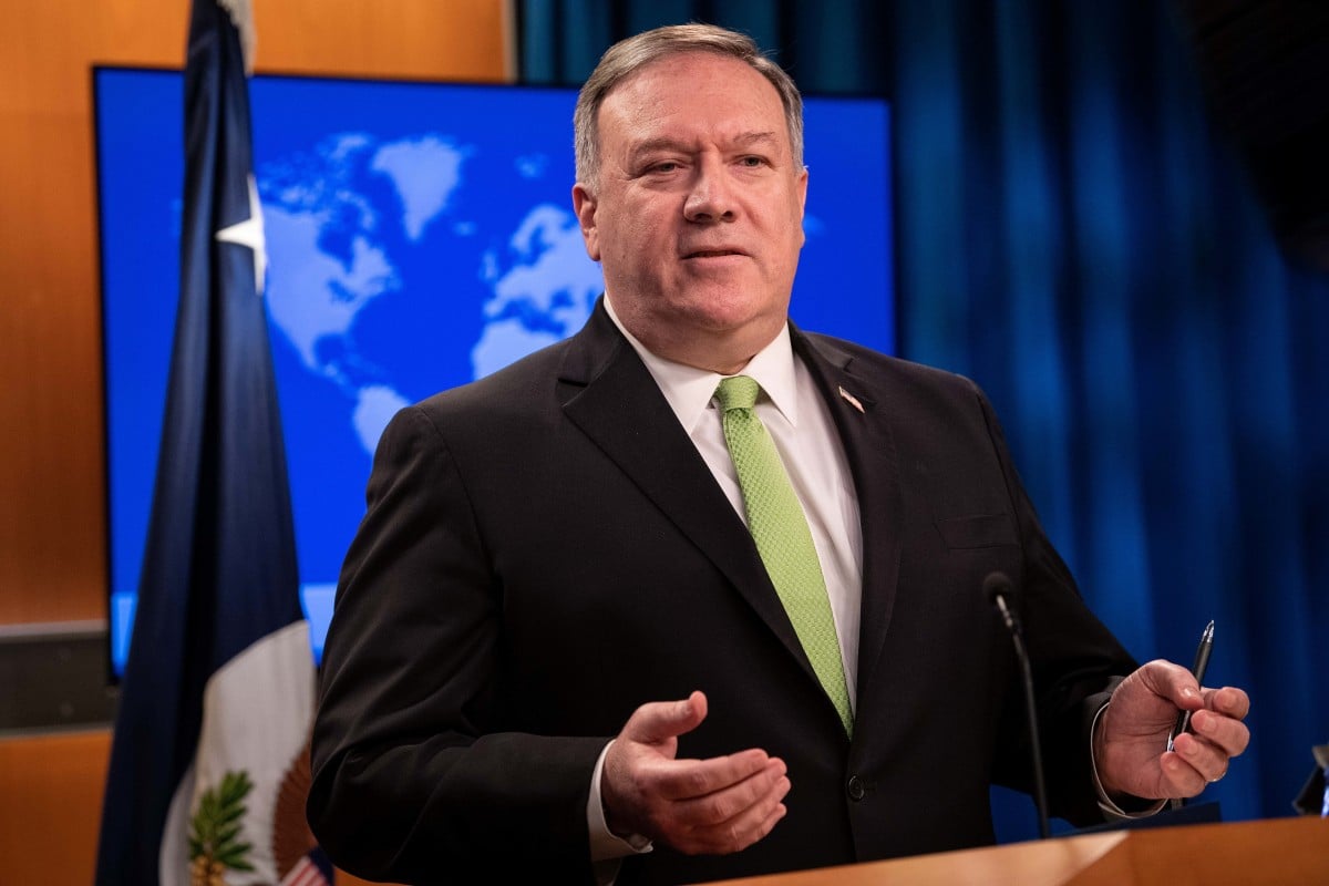 U.S. Secretary of State Mike Pompeo speaks to the media at the State Department in Washington, DC. Nicholas Kamm/Pool via REUTERS