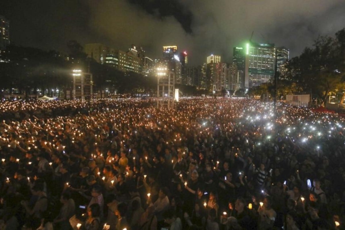 Hong Kong's Victoria Park is filled with candles as attendees mark the anniversary of the Tiananmen Square crackdown.