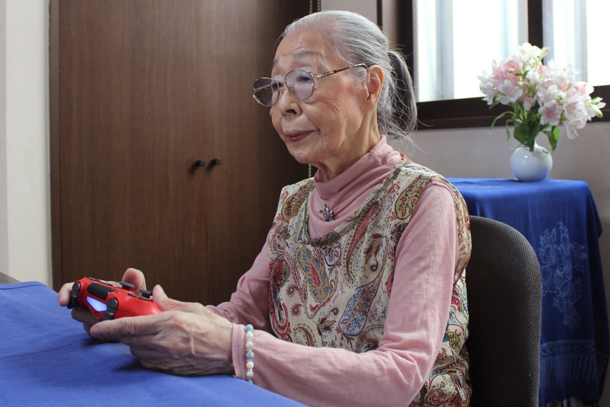 Hamako Mori may look like a sweet little old lady, but she spends three hours a day eviscerating foes – on a screen, of course. AFP PHOTO / Courtesy of Keisuke Nagao