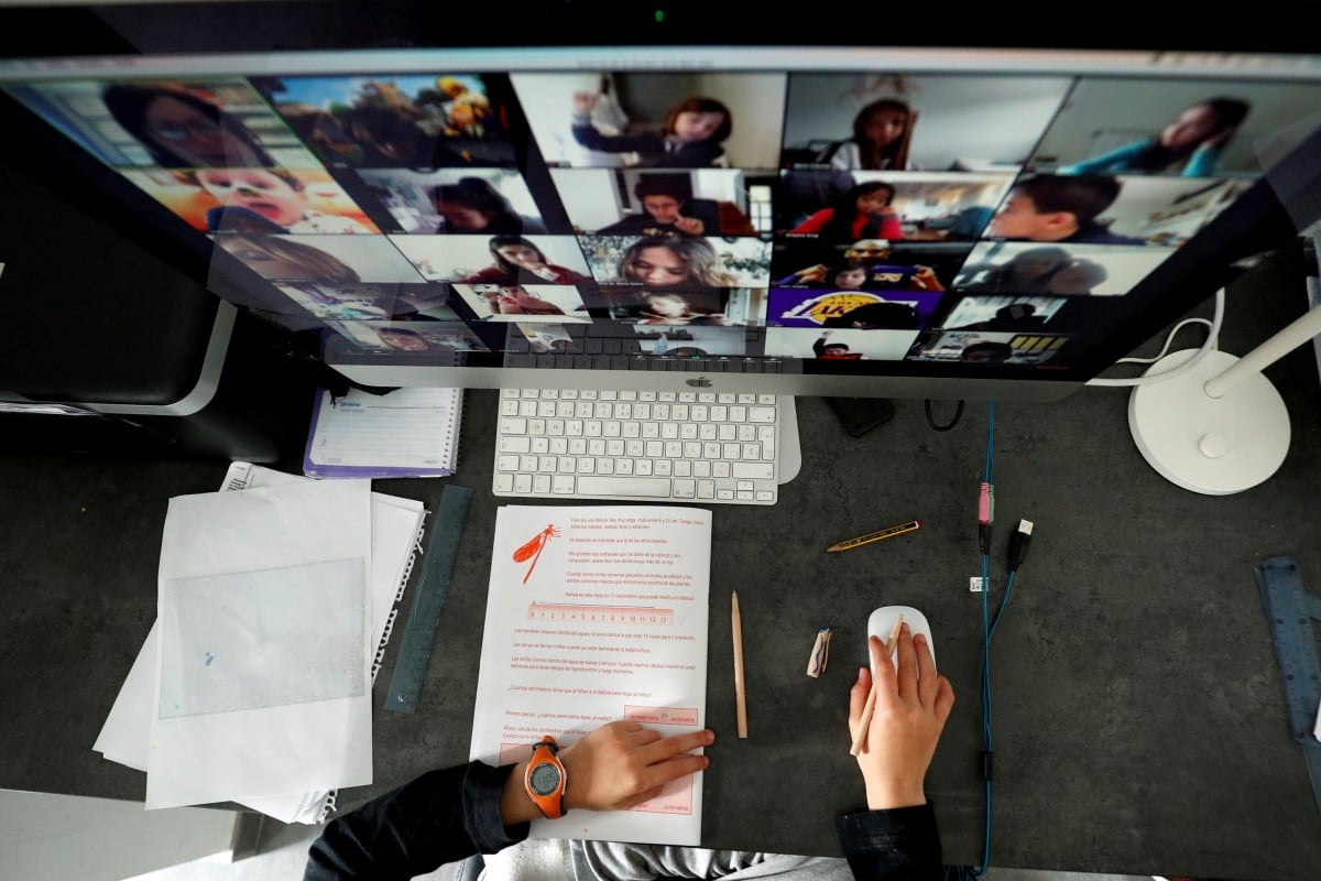 Many students took classes via Zoom during the Covid-19 class suspensions. REUTERS/ Albert Gea/File Photo