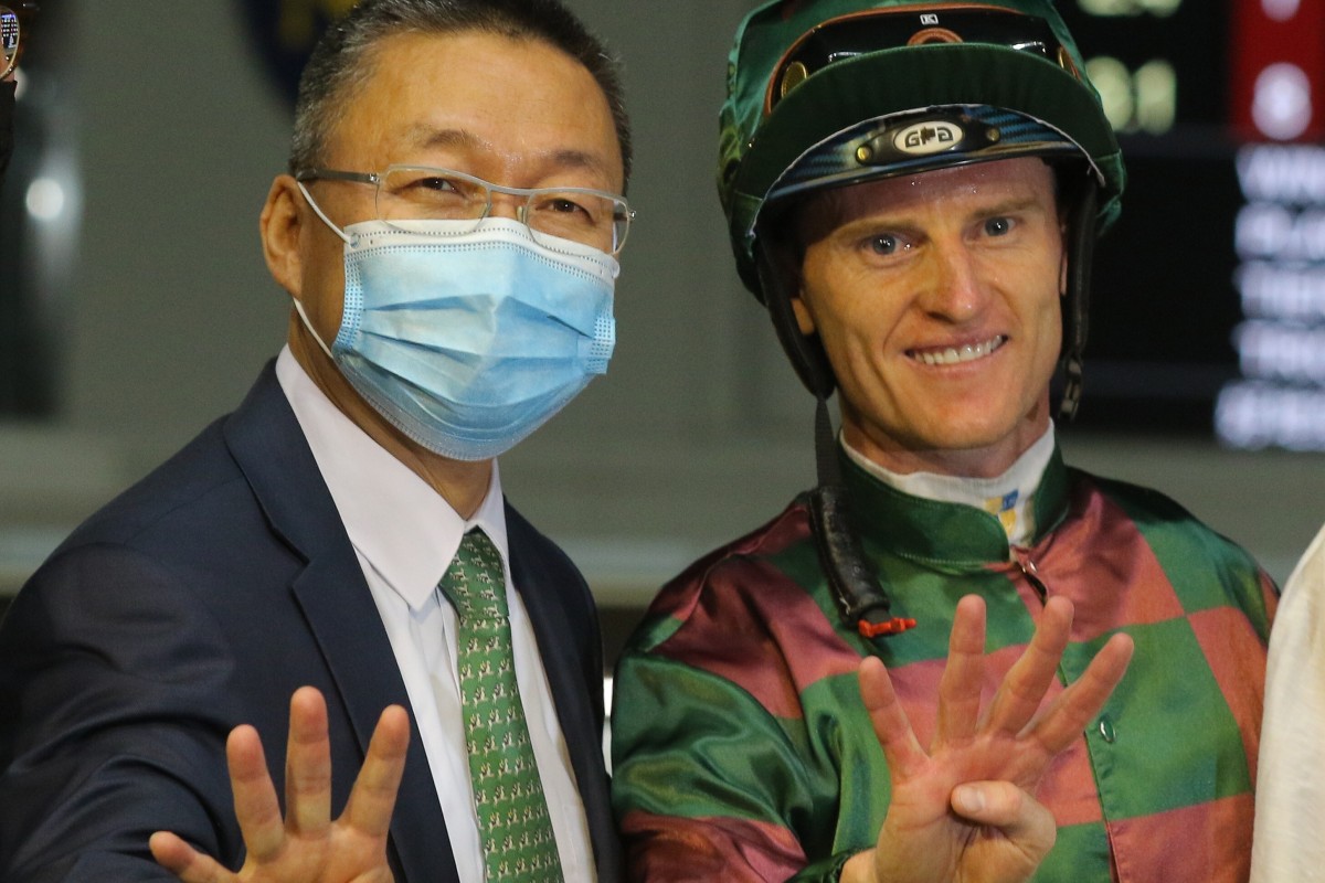 Jockey Zac Purton and trainer Francis Lui celebrate their four-timer at Happy Valley on Wednesday night. Photos: Kenneth Chan