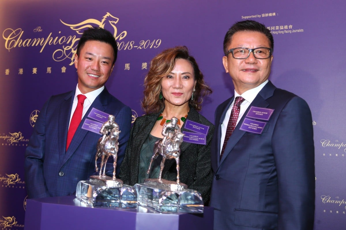 Exultant’s owners Eddie Wong Ming-chak (right) and Wong Leung Sau-hing (centre) with son Kirk Wong King-wai (left) at the 2018-19 Champions Awards. Photos: Kenneth Chan