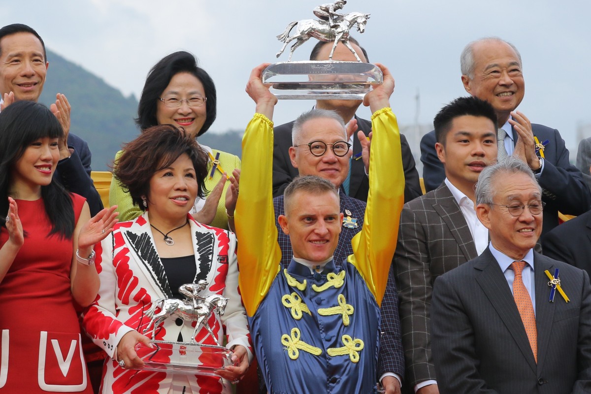 Zac Purton collects his champion jockey award. Photos: Kenneth Chan