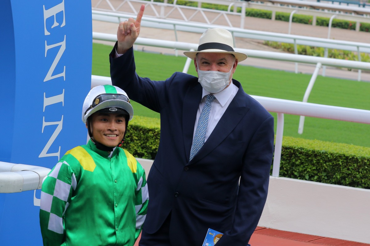 Trainer David Hayes and jockey Keith Yeung celebrate Moneymore’s win at Sha Tin on Sunday. Photos: Kenneth Chan