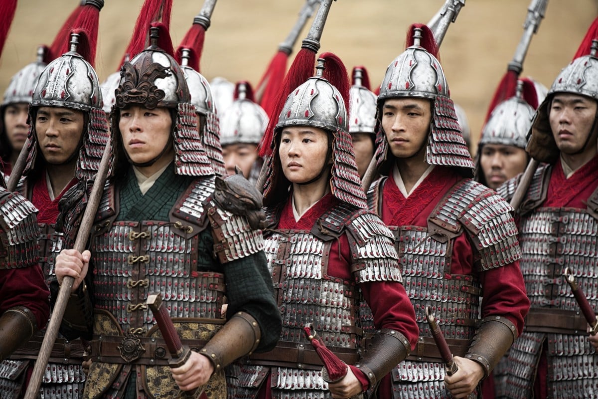 Liu Yifei (centre) stars in the title role in Disney's 'Mulan', which has been mired in controversy.
