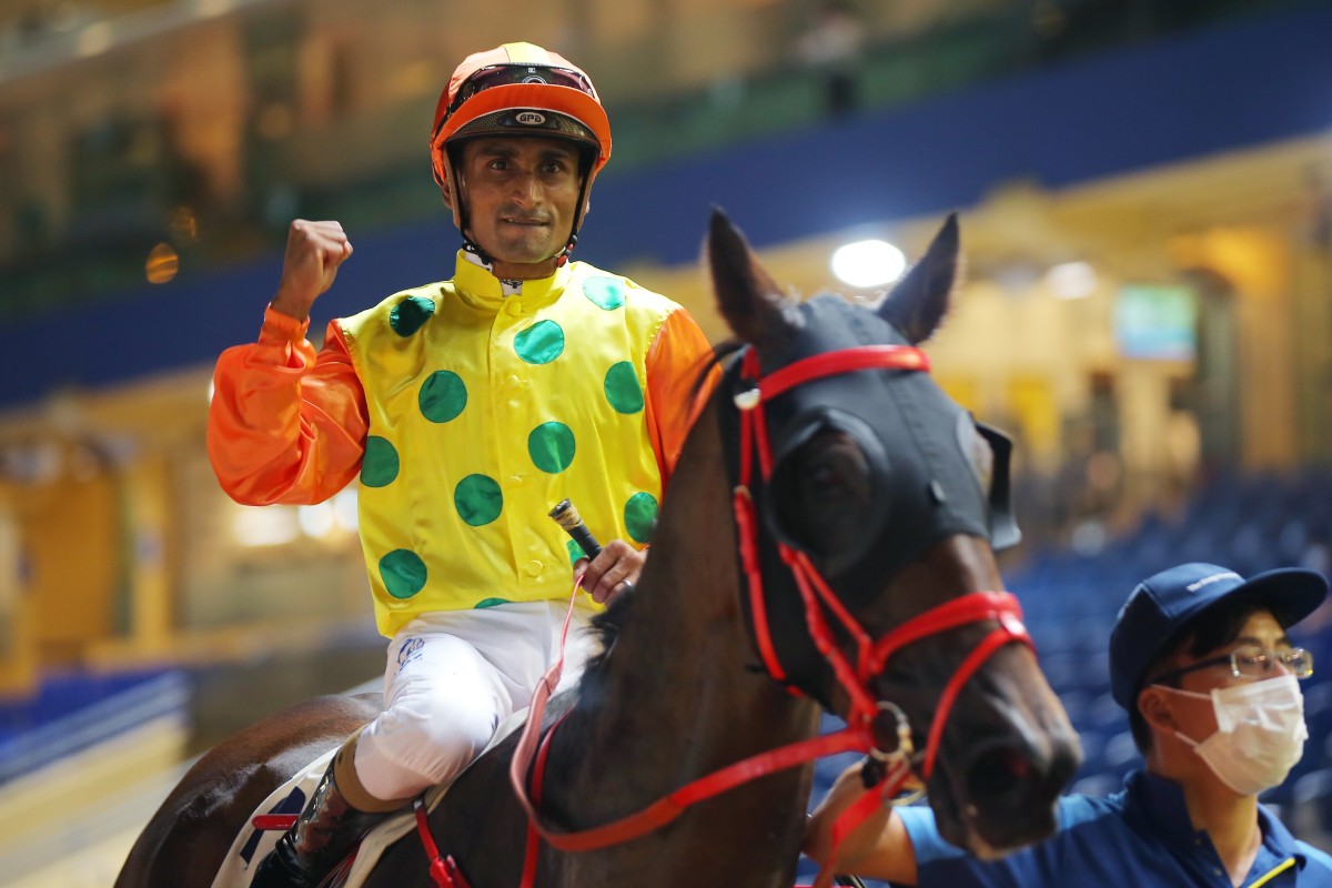 Karis Teetan pumps his fist after winning aboard Supreme Plus at Happy Valley on Wednesday night. Photos: Kenneth Chan
