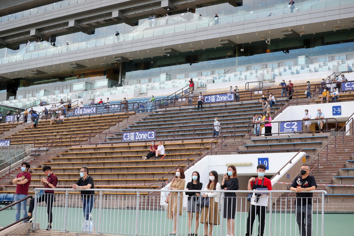 Fans in the stands enjoy the action at Sha Tin on Sunday. Photos: Kenneth Chan