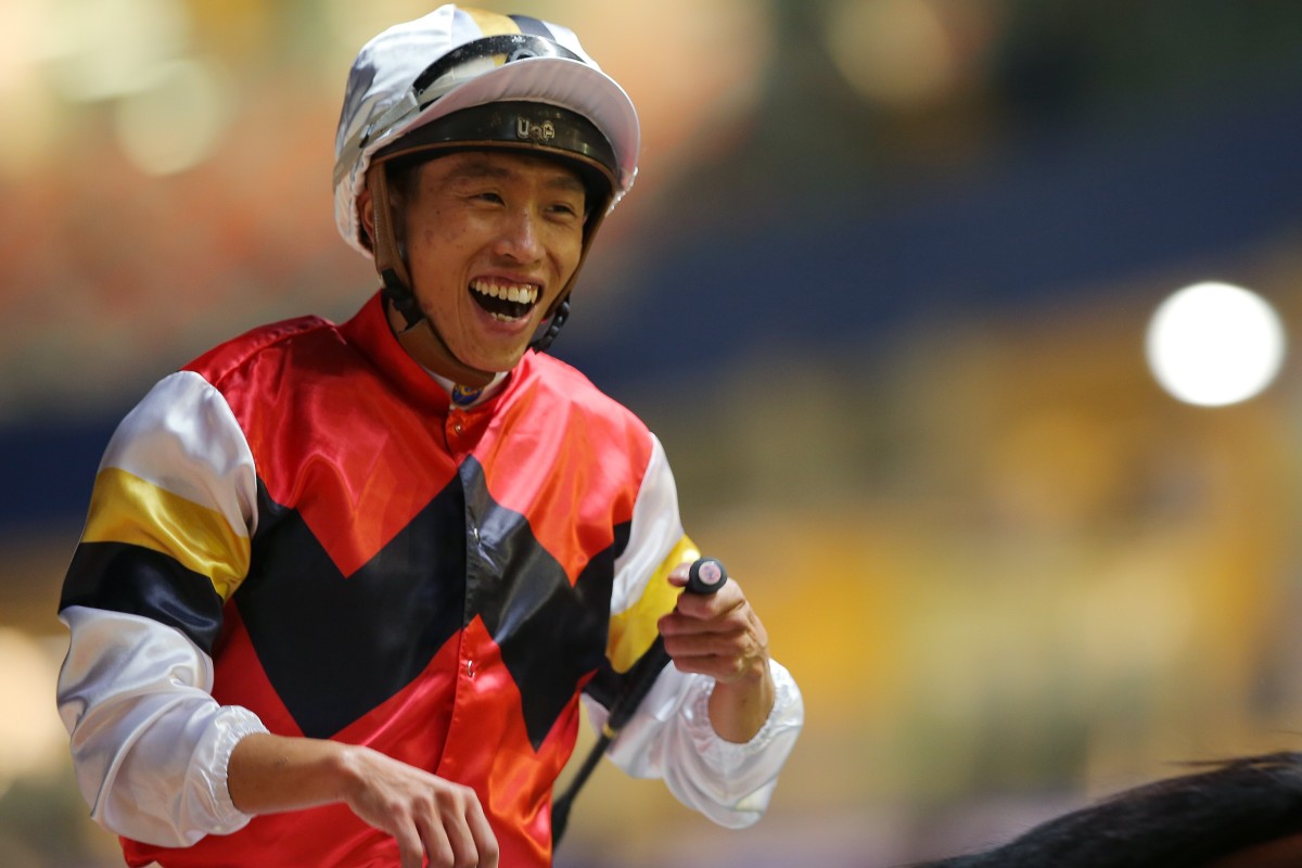 Vincent Ho laughs in delight after Stock Legend’s stunning win at Happy Valley on Wednesday night. Photos: Kenneth Chan