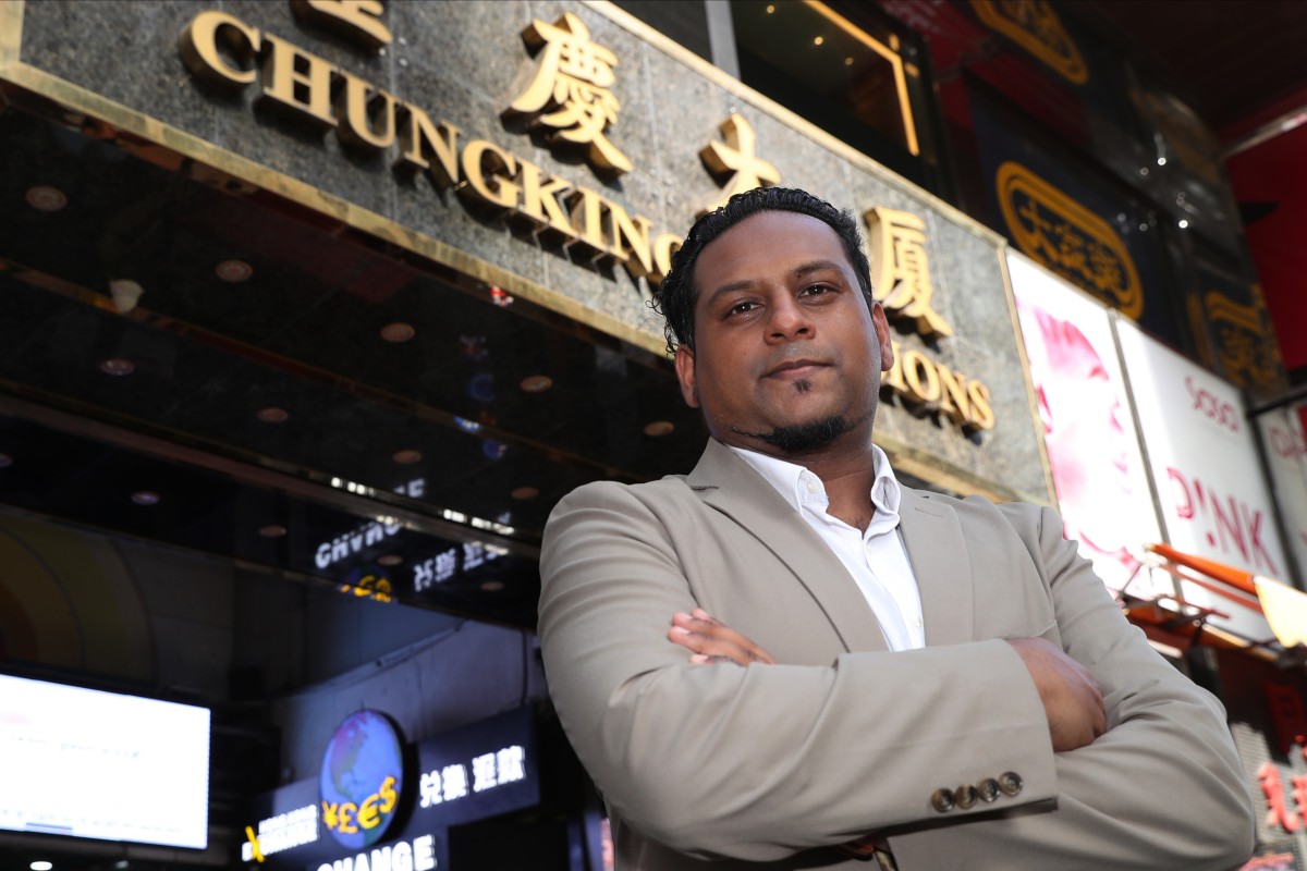Social worker Jeffrey Andrews outside Chungking Mansions, where he has an office. Photo: SCMP/Edmond So