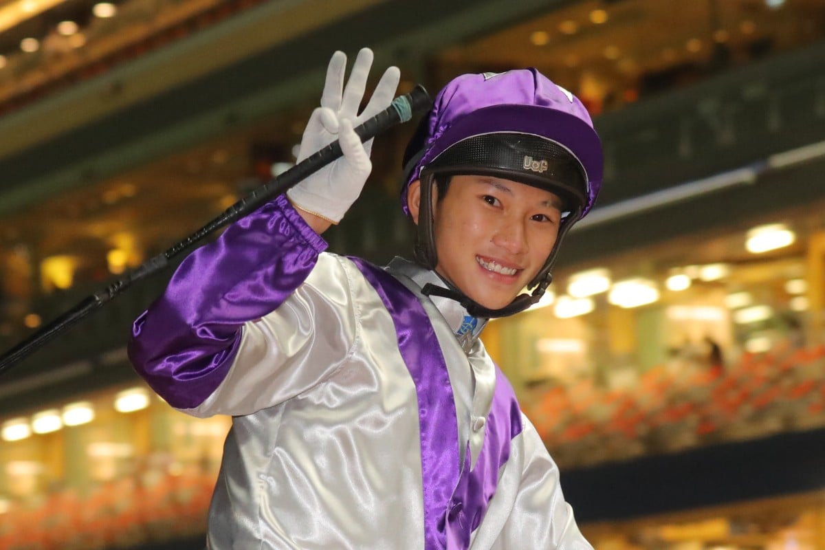 Jerry Chau flashes a smile after completing a treble at Happy Valley on Wednesday night. Photo: Kenneth Chan