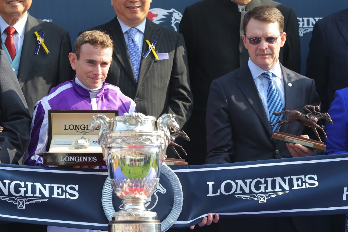 Ryan Moore and Aidan O’Brien collect the Hong Kong Vase trophies after Highland Reel’s win in 2017. Photo: Kenneth Chan