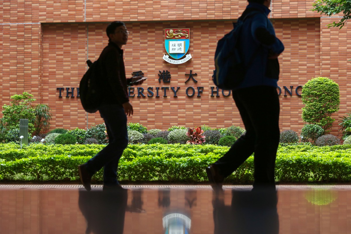 Visitors walks past a logo of University of Hong Kong at HKU in Pok Fu Lam. Photo: SCMP/Nora Tam