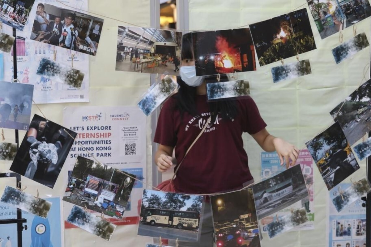 Photos showing last year's occupation of the Chinese University campus are displayed in an exhibition organised by the student union.