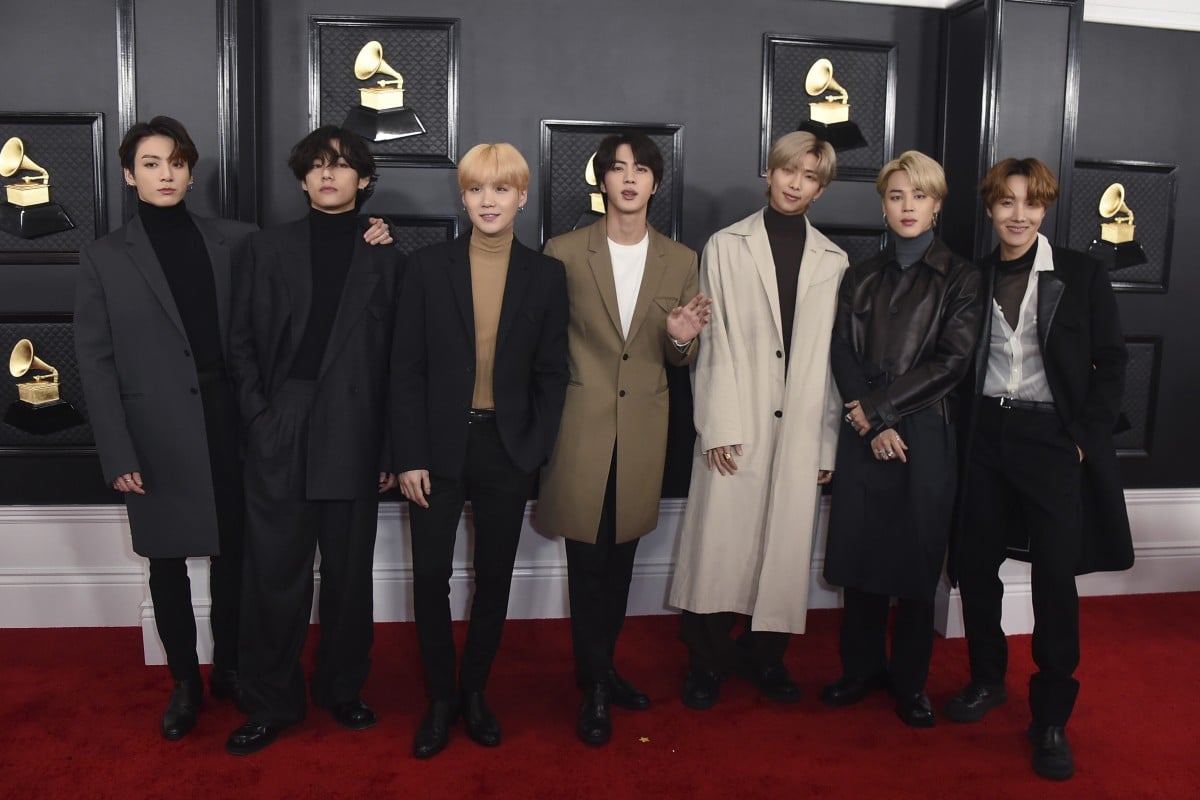 BTS have been given an extension on their world takeover now Jin can stay an extra two years. Photo: AP