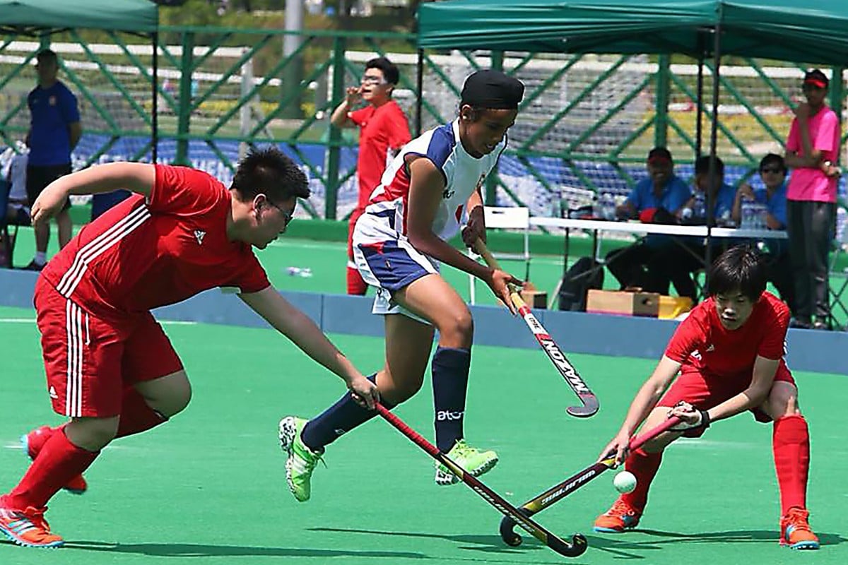 Amoldeep Singh (centre) hopes to inspire other young athletes. Photo: Courtesy of Amoldeep Singh