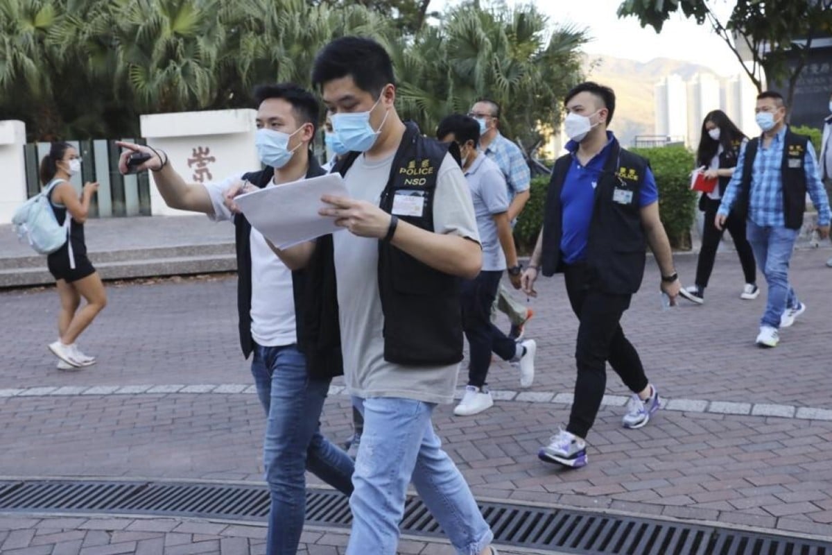 Officers from the police national security unit carry out an investigation after the rally at Chinese University last month. Photo: Dickson Lee