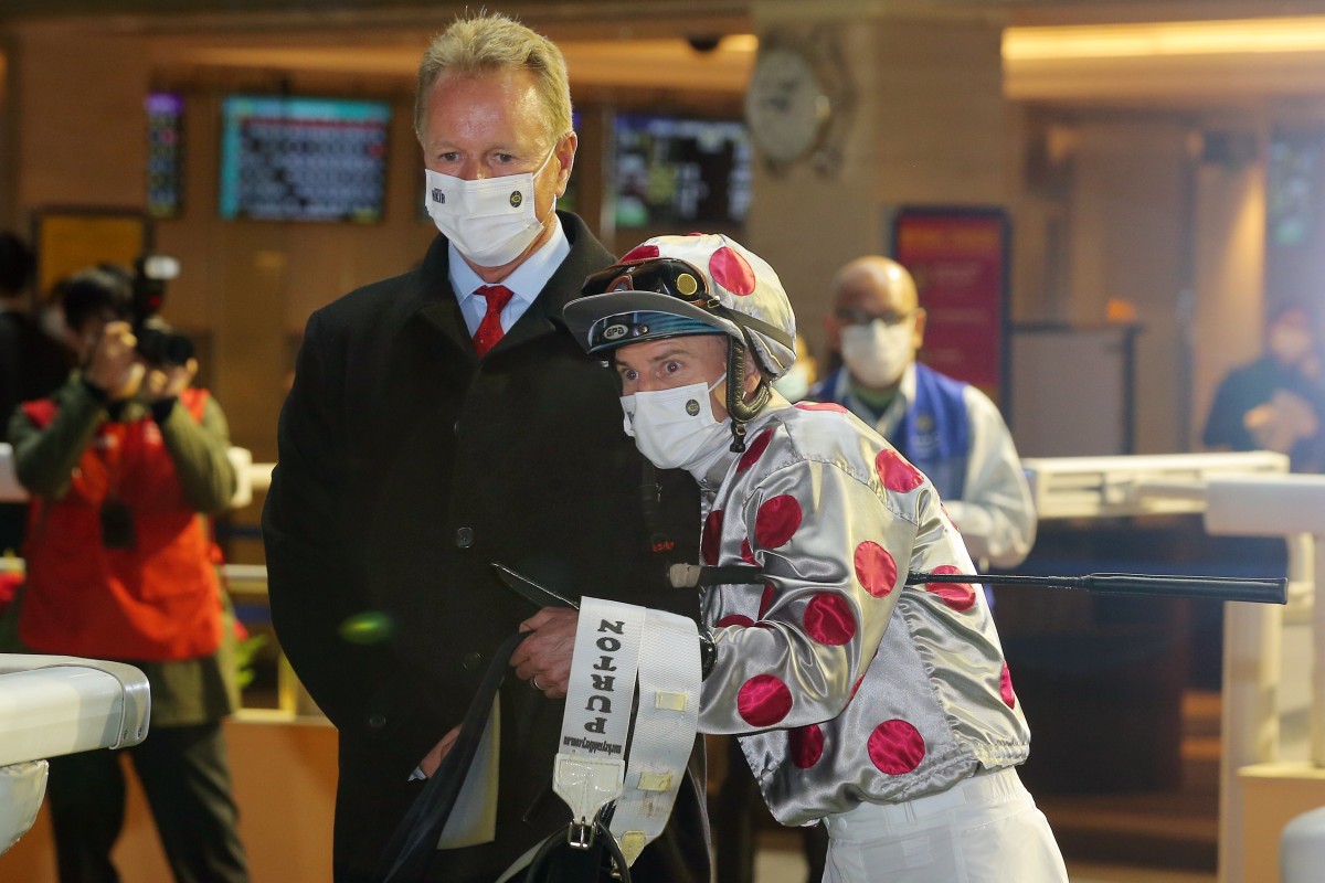 Zac Purton hugs trainer Tony Millard after Gift Of Lifeline’s victory at Happy Valley. Photos: Kenneth Chan