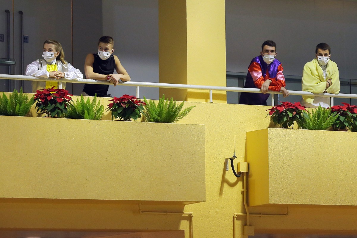 The visiting jockeys look out over Happy Valley from their separate rooms on Wednesday night. Photo: Kenneth Chan