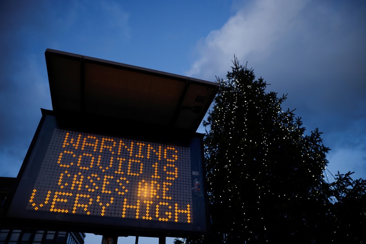 An electronic sign displays information as the British government imposes a stricter tiered set of restrictions amid the coronavirus outbreak in London. Photo: Reuters