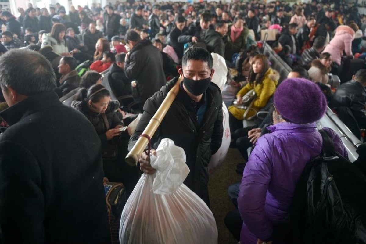 People in China have been told to avoid going back to their hometowns for Lunar New Year as the country deals with new outbreaks of Covid-19. Photo: Reuters