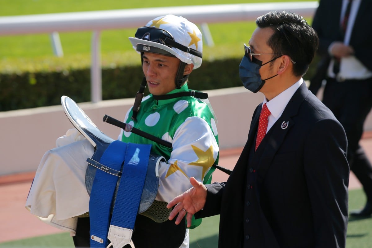 Apprentice Alfred Chan and trainer Frankie Lor discuss Golfman Star’s win at Sha Tin in December. Photos: Kenneth Chan
