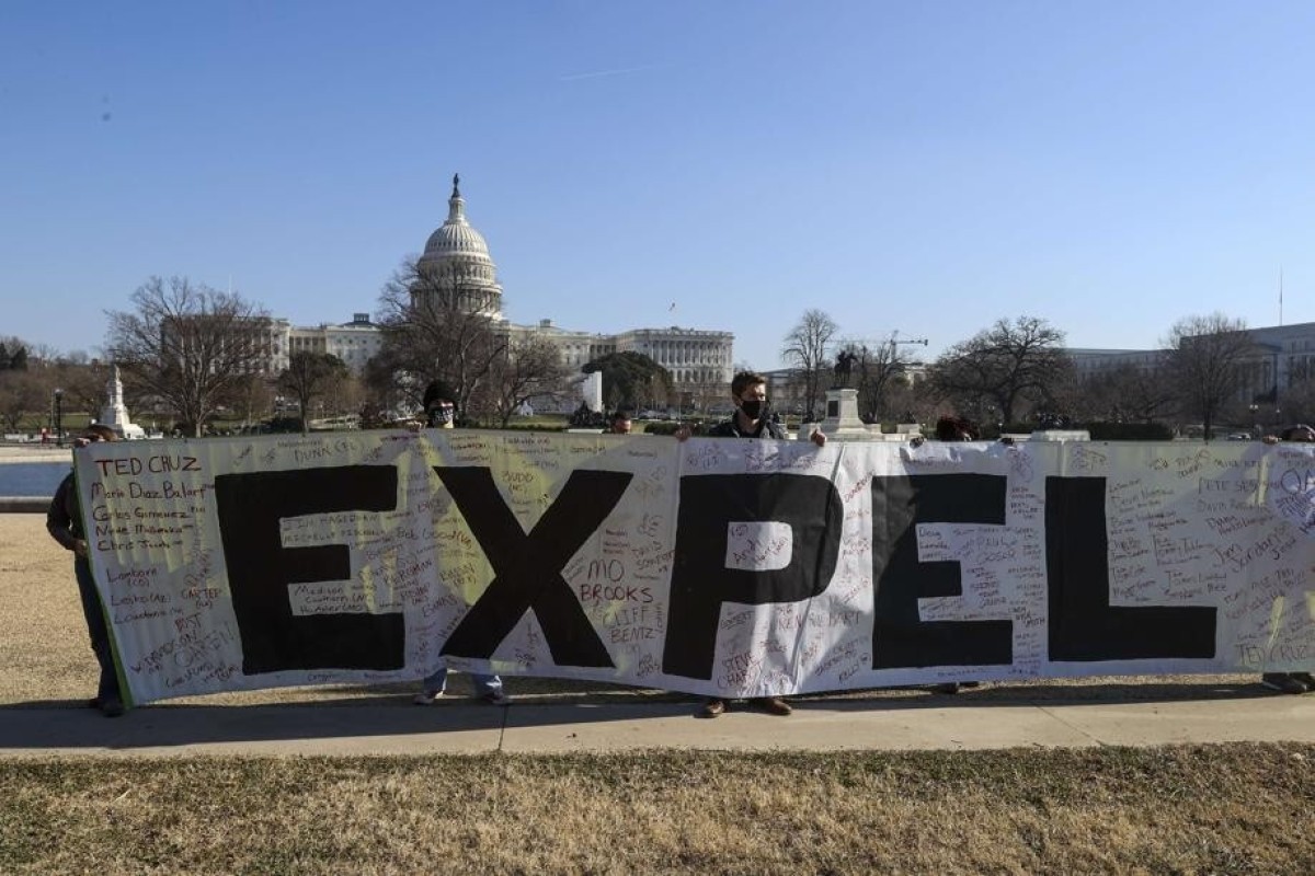 Anti-Trump protesters gather near the US Capitol on Wednesday as the House of Representatives voted to impeach President Donald Trump. Photo: Getty Images/AFP