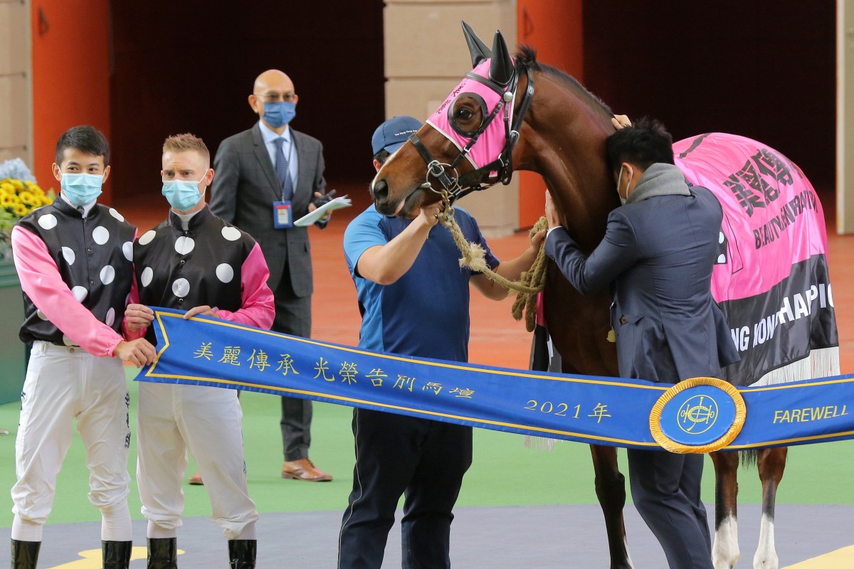 Owner Patrick Kwok gives Beauty Generation a hug at Sha Tin on Sunday. Photos: Kenneth Chan