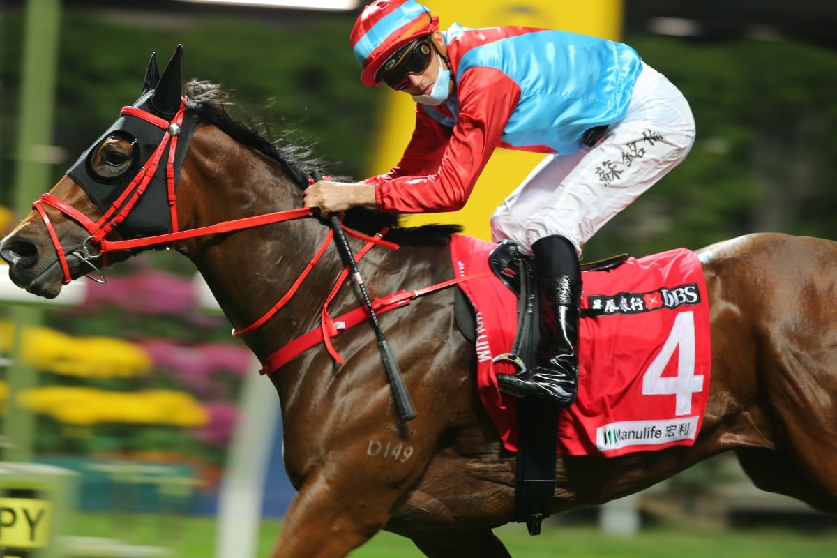 Christophe Soumillon crosses the line a winner at Happy Valley on Wednesday night. Photos: Kenneth Chan