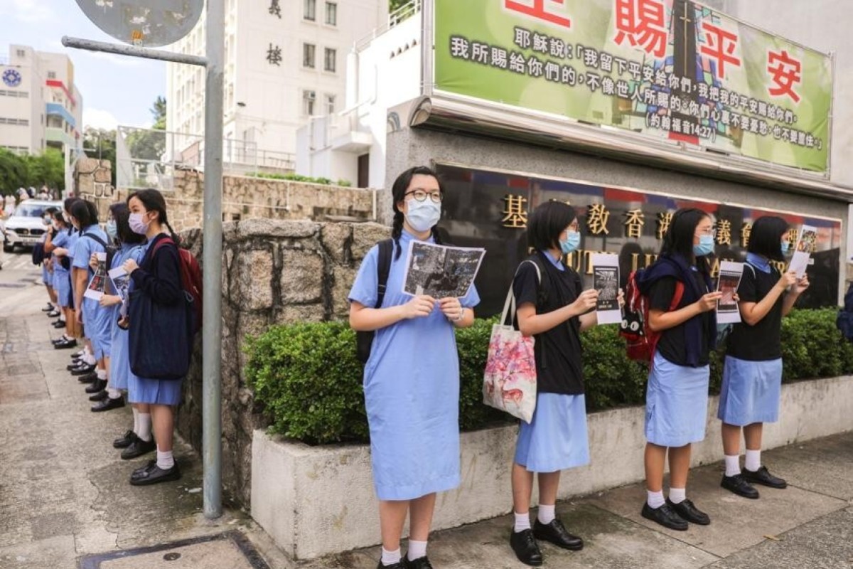 Students form a human chain last June marking the anniversary of the start of the 2019 anti-government protests. Photo: SCMP/ Sam Tsang