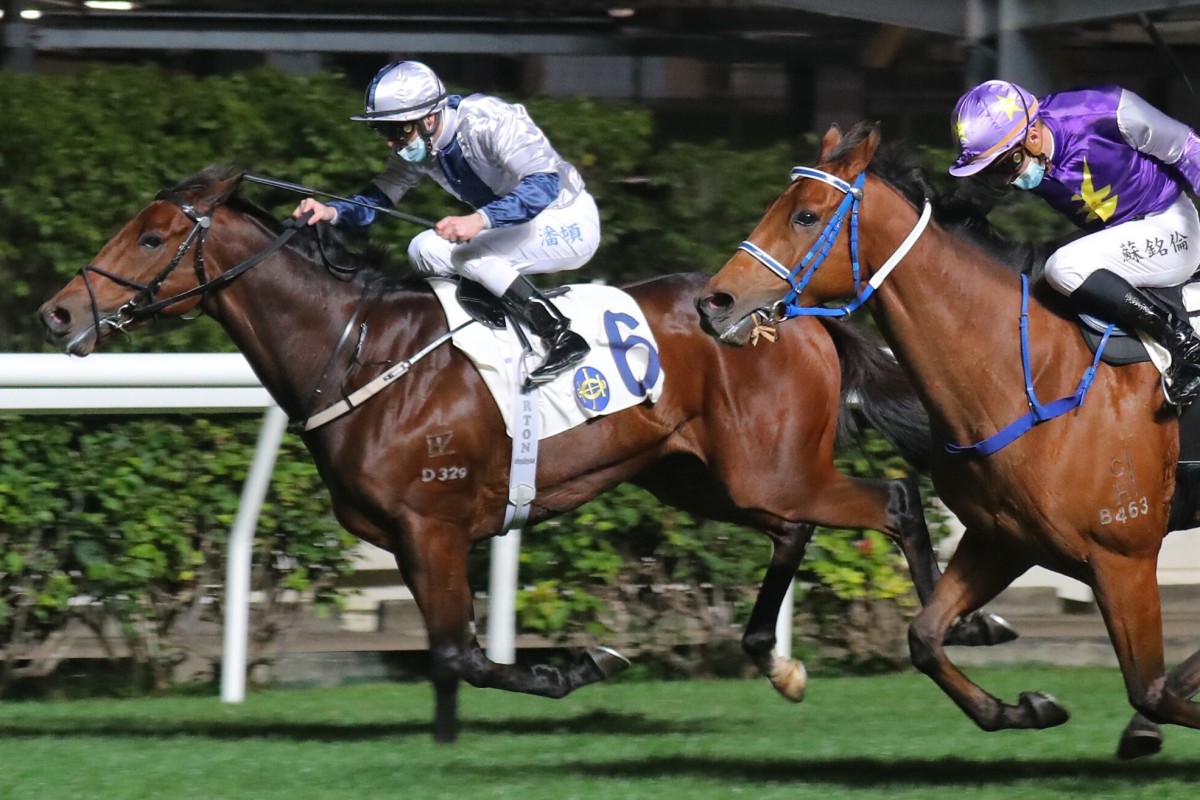 Zac Purton boots Maldives (inside) to victory at Happy Valley last month. Photos: Kenneth Chan