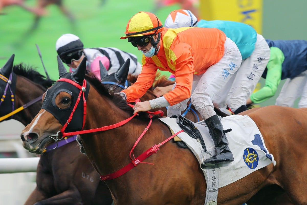Flagship Glory hits the line to salute under Zac Purton at Sha Tin on Sunday. Photos: Kenneth Chan