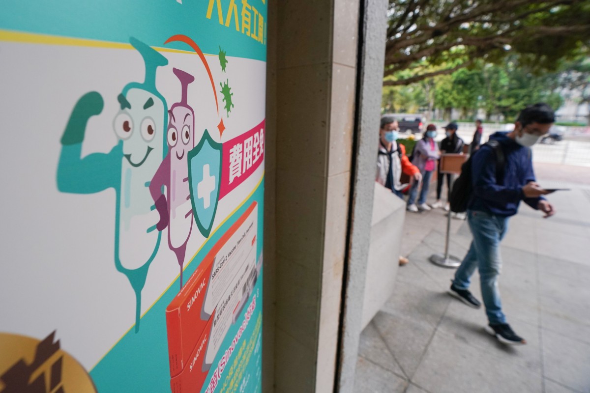 People queue up for Covid-19 vaccines at Sha Tin's Community Vaccination Centre. Photo: SCMP / Felix Wong