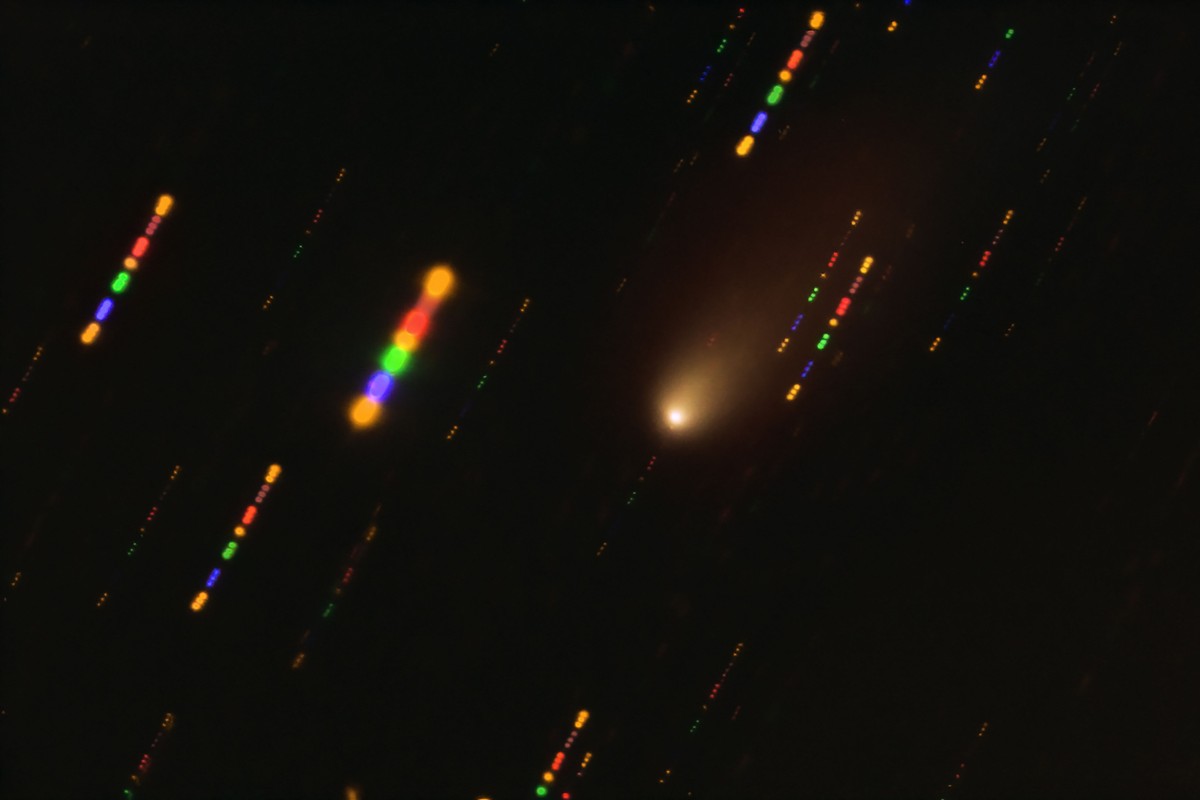 This handout image from the European Southern Observatory shows the comet 2I/Borisov passing near the sun, taken with the FORS2 instrument on ESO's Very Large Telescope in late 2019. Since the comet was travelling at breakneck speed, the background stars appeared as streaks of light as the telescope followed the comet's trajectory. Photo: AFP