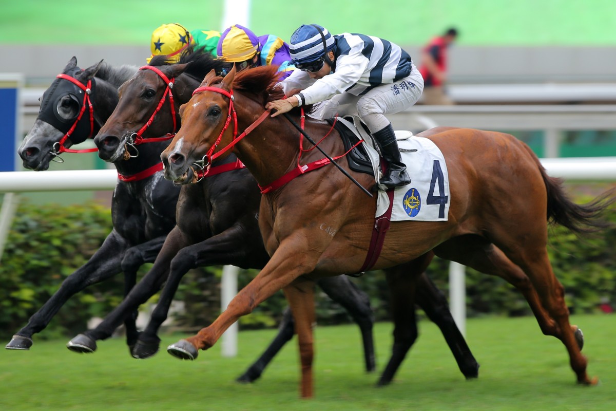 Matthew Poon drives Butterfield to victory in the Group Three Queen Mother Memorial Cup. Photos: Kenneth Chan